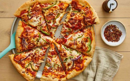 خواردنی پیتزا کارەساتێکی ئاوا ترسناکت بۆ دەهێنێت